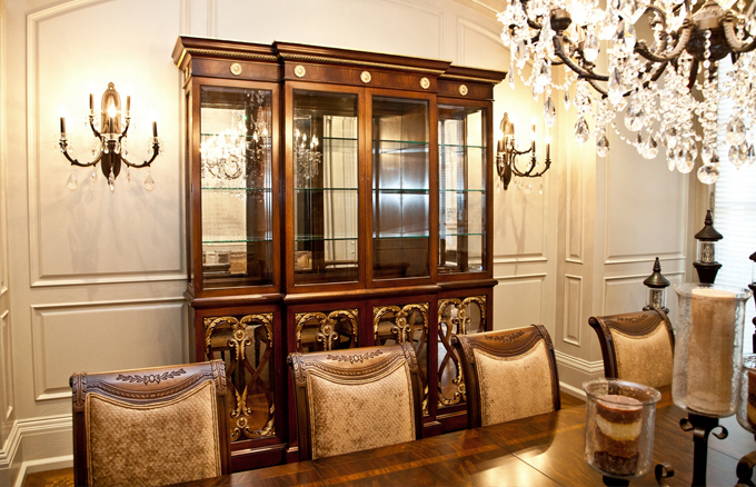 Wooden Antique Shelf In Living Room Behind Dining Chairs