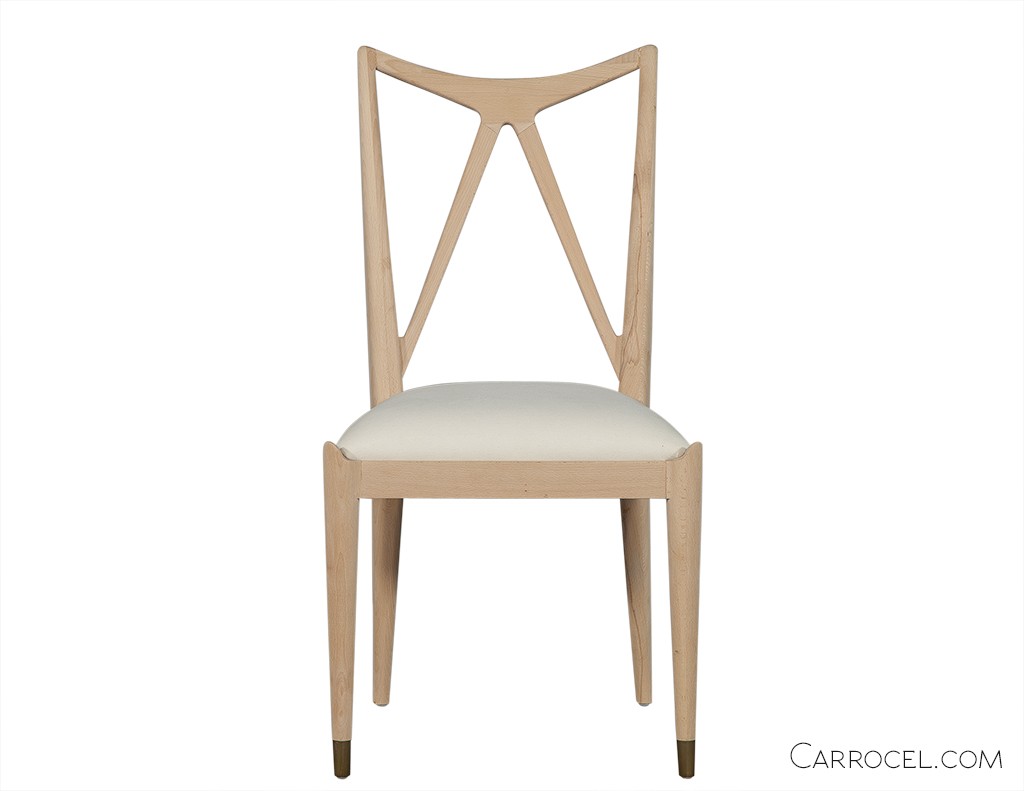 White dining room chair with a W pattern