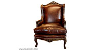 Carved Louis XV Styled Leather Wing Chair