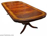 Custom triple banded flamed mahogany dining table