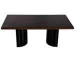 Custom walnut starburst dining table with a striking design and black pedestals offering modern elegance and sturdy support.