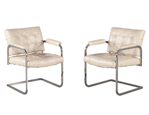 Pair of Mid-Century Modern Tufted Cream Leather Accent Chairs