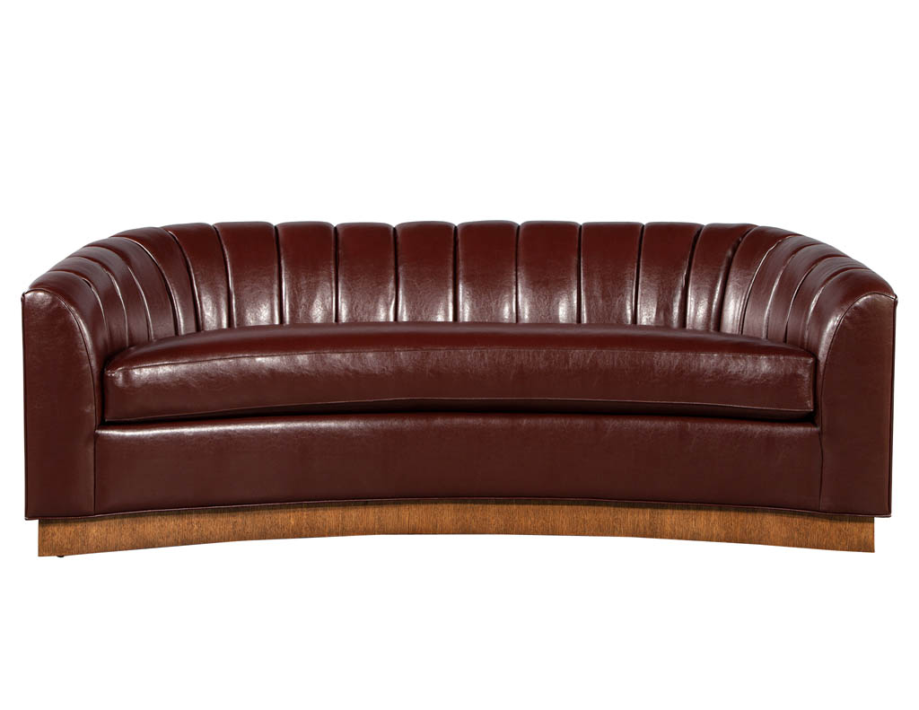 Curved back leather shop sofa