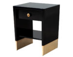 Black lacquer nightstand with gold-tone base and single drawer, featuring a round brass knob and open lower shelf.