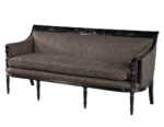 Classic French-style sofa with black carved wood frame, striped seat upholstery, and turned legs for a formal living room.