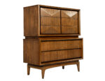 A mid-century modern armoire for sale in Toronto, crafted with rich wood and geometric drawer designs.