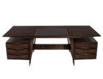 Custom modern walnut executive desk with ample storage and a sleek, polished surface for an elegant office setup.