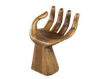 Artistic wooden hand sculpture, a unique and striking piece of accent seating decor for your home or office space.